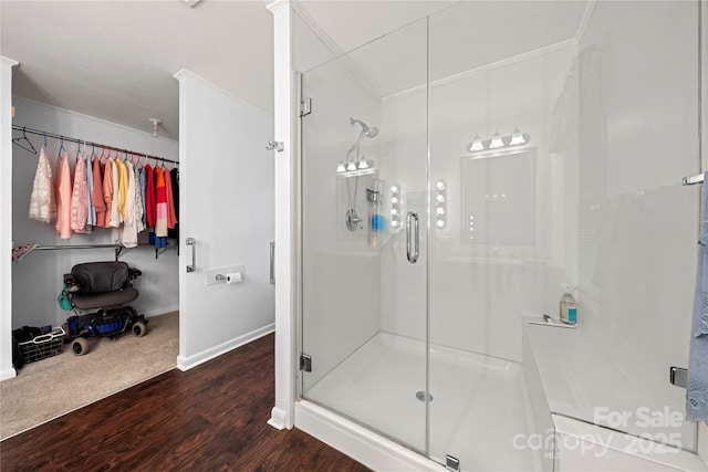 725 Plantation Rd, Lancaster, SC 29720 - bathroom featuring wood finished floors, a stall shower, and crown molding