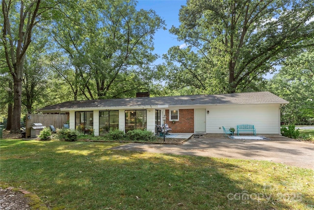 725 Plantation Rd, Lancaster, SC 29720 - view of front of home with a chimney and brick siding