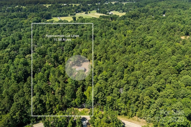 8333 Catawba Cove Dr, Belmont, NC 28012 - aerial view of property and surrounding area with property parcel outlined and a heavily wooded area