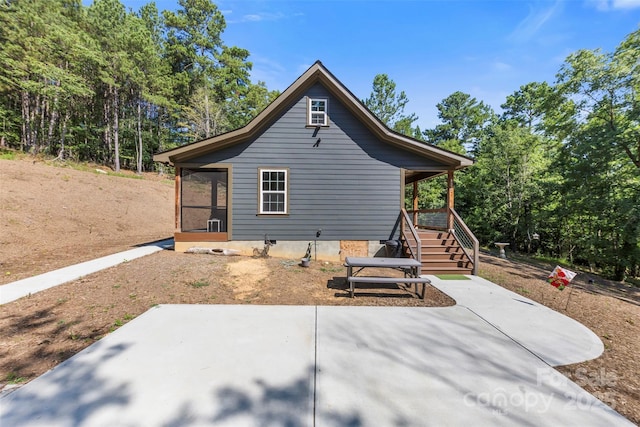 8333 Catawba Cove Dr, Belmont, NC 28012 - back of house featuring a sunroom, crawl space, and a patio area