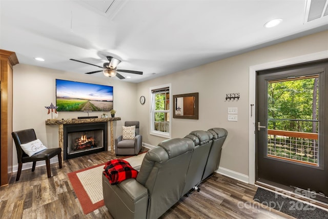 8333 Catawba Cove Dr, Belmont, NC 28012 - living area with dark wood finished floors, a tiled fireplace, recessed lighting, ceiling fan, and attic access