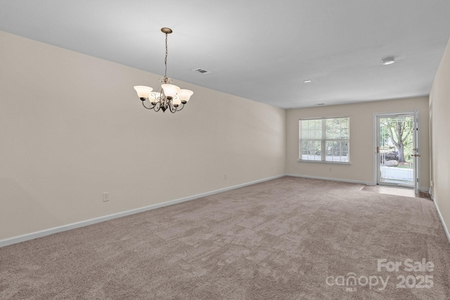 348 Tidmarsh Ct NW, Concord, NC 28027 - carpeted empty room featuring a chandelier and a smoke detector