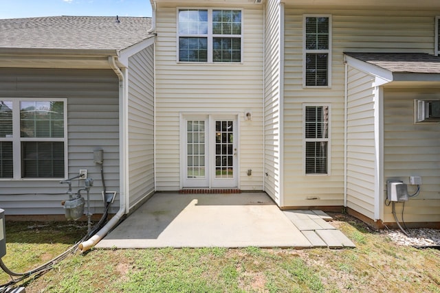 348 Tidmarsh Ct NW, Concord, NC 28027 - back of property featuring roof with shingles and a patio
