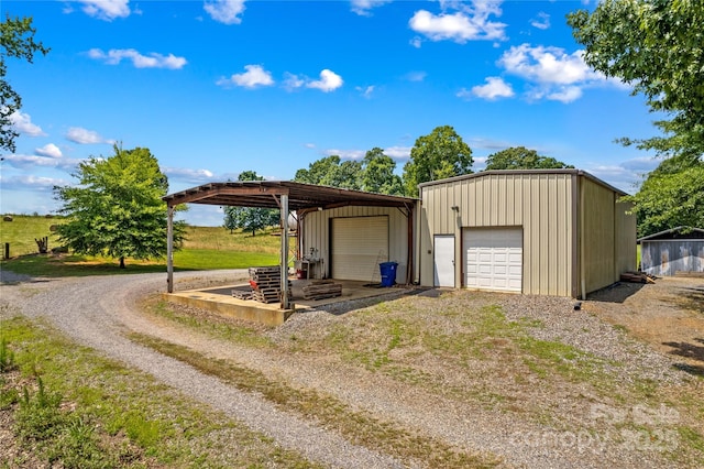 144 J And W Rd, Olin, NC 28660 - garage featuring a detached garage and driveway