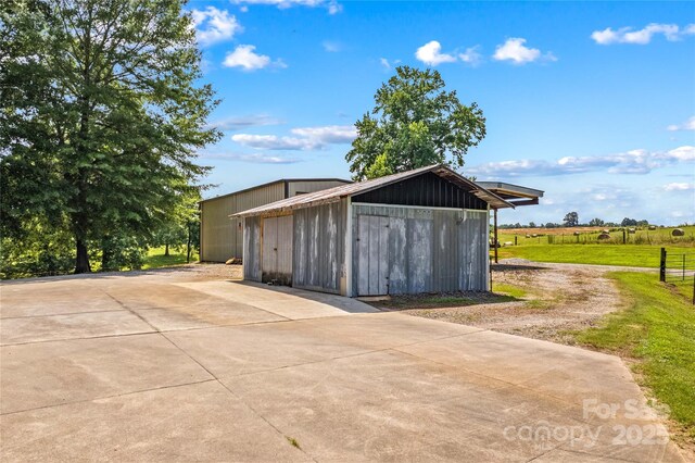 144 J And W Rd, Olin, NC 28660 - garage featuring driveway