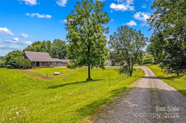 144 J And W Rd, Olin, NC 28660 - view of front facade with a front yard and driveway