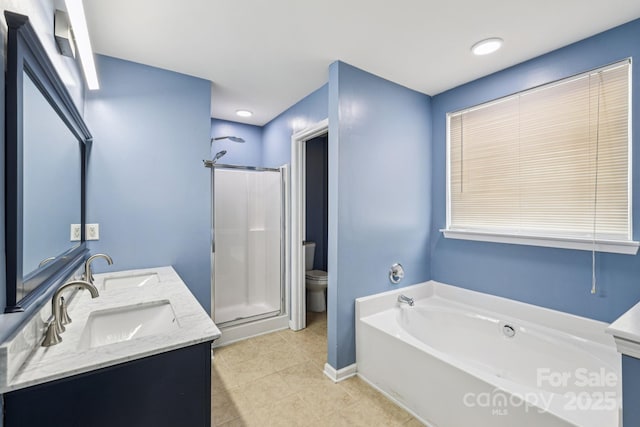 16009 Stuarts Draft Ct, Charlotte, NC 28278 - full bath featuring a stall shower, double vanity, a bath, and tile patterned floors