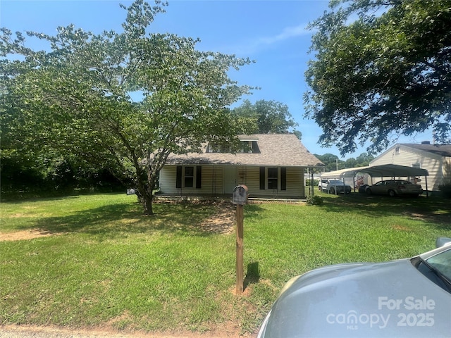 1014 8th St, Statesville, NC 28677 - view of front facade featuring a front lawn and roof with shingles