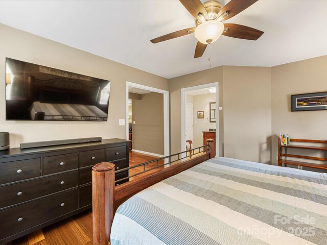 9237 N Vicksburg Park Ct, Charlotte, NC 28210 - bedroom with dark wood-style floors and a ceiling fan