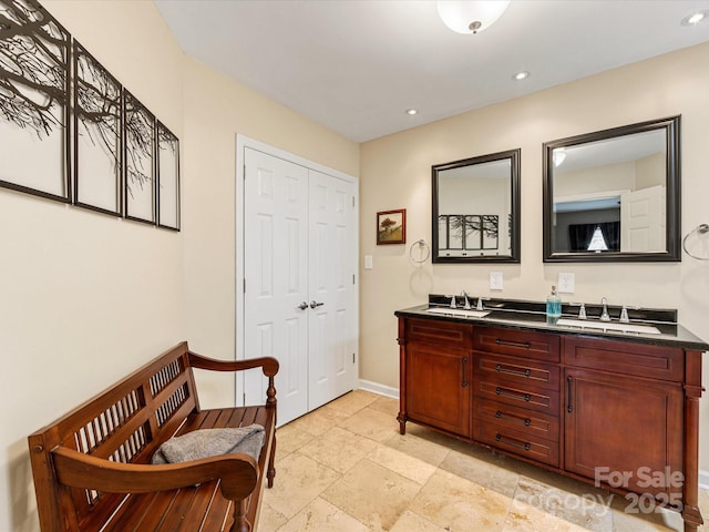 9237 N Vicksburg Park Ct, Charlotte, NC 28210 - full bath featuring double vanity, stone tile floors, and recessed lighting