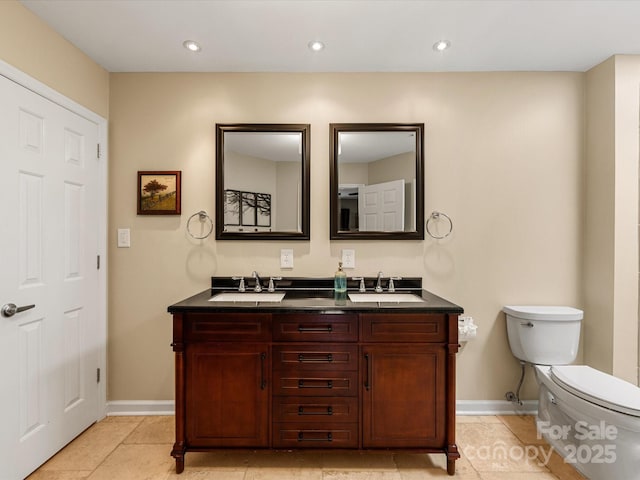 9237 N Vicksburg Park Ct, Charlotte, NC 28210 - full bath featuring double vanity, tile patterned floors, and recessed lighting