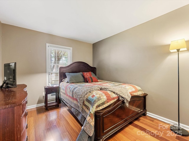 9237 N Vicksburg Park Ct, Charlotte, NC 28210 - bedroom with wood finished floors and baseboards