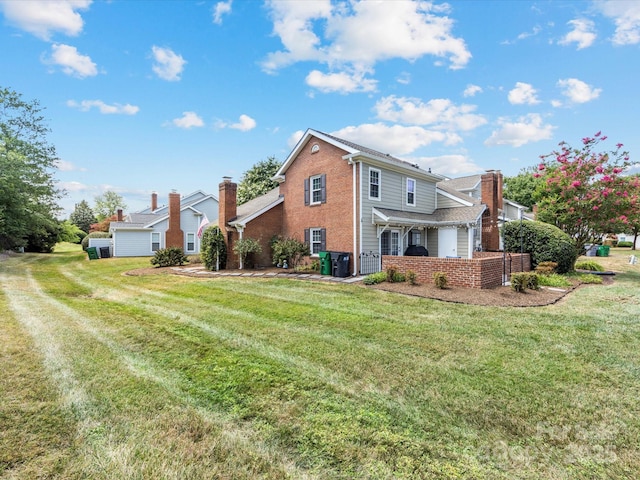 9237 N Vicksburg Park Ct, Charlotte, NC 28210 - back of property featuring a yard and brick siding