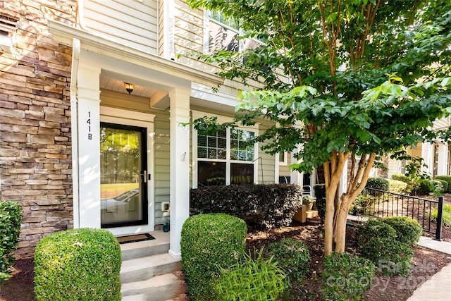 141 Leyton Loop Unit B, Mooresville, NC 28117 - view of exterior entry featuring a porch