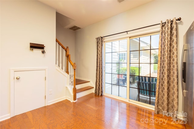 141 Leyton Loop Unit B, Mooresville, NC 28117 - foyer entrance featuring wood finished floors and stairway