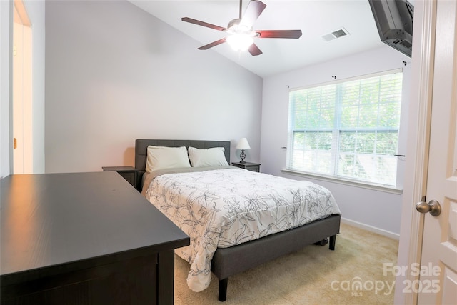 141 Leyton Loop Unit B, Mooresville, NC 28117 - bedroom featuring vaulted ceiling, light carpet, and a ceiling fan