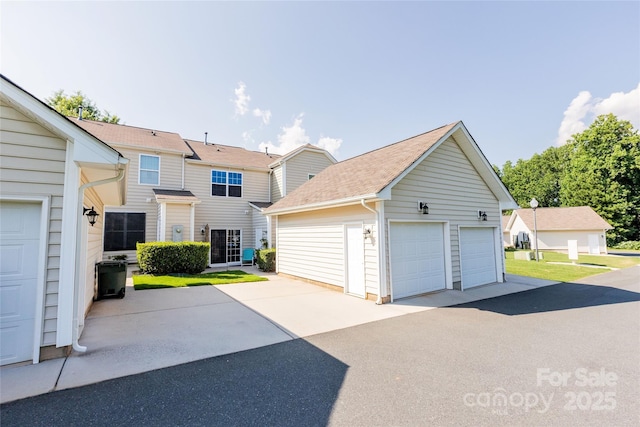 141 Leyton Loop Unit B, Mooresville, NC 28117 - view of front of home featuring a garage and an outdoor structure