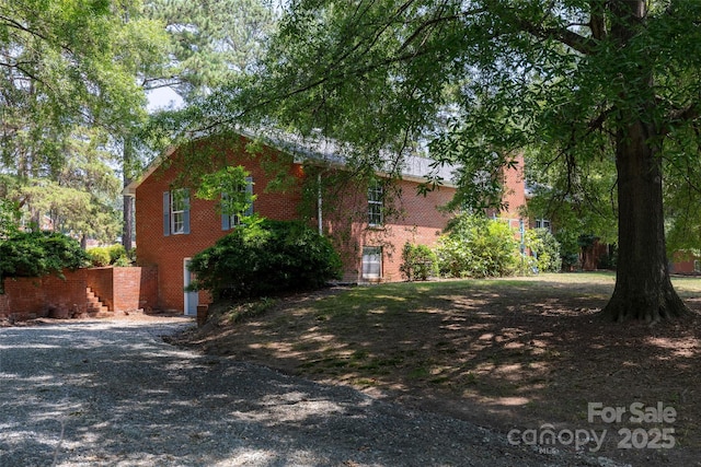 621 Big Lick Rd, Oakboro, NC 28129 - view of side of property featuring brick siding