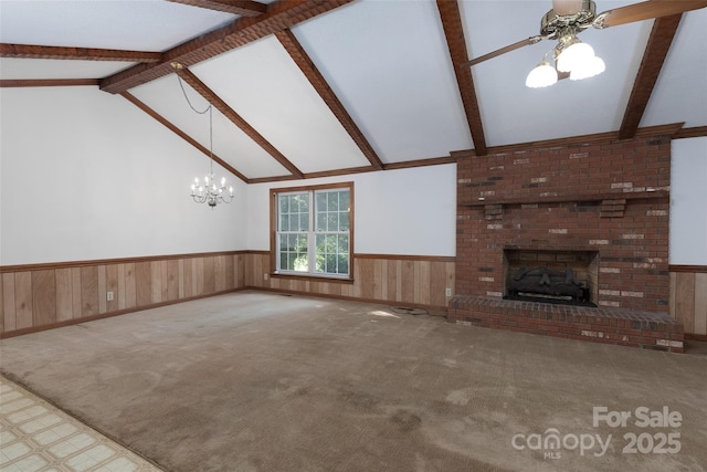 621 Big Lick Rd, Oakboro, NC 28129 - unfurnished living room featuring a fireplace, a chandelier, wainscoting, ceiling fan, and carpet flooring