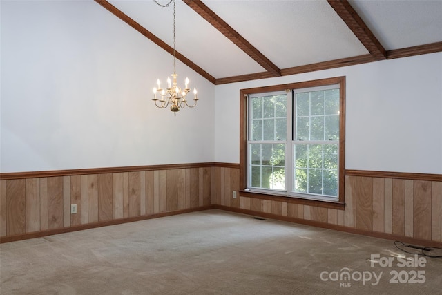 621 Big Lick Rd, Oakboro, NC 28129 - unfurnished room featuring a chandelier, a wainscoted wall, wood walls, and carpet