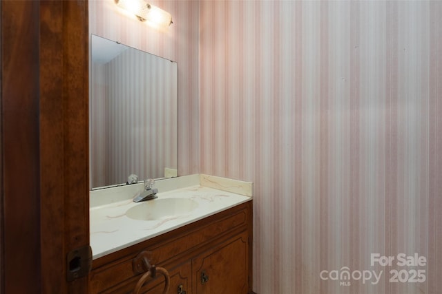 621 Big Lick Rd, Oakboro, NC 28129 - bathroom featuring wallpapered walls and vanity
