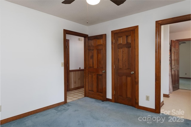 621 Big Lick Rd, Oakboro, NC 28129 - unfurnished bedroom featuring carpet flooring and ceiling fan