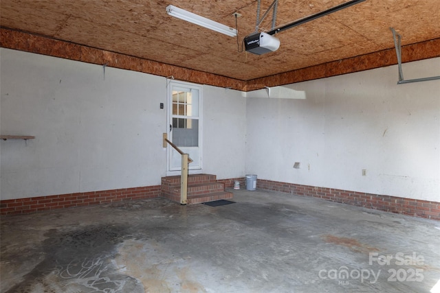 621 Big Lick Rd, Oakboro, NC 28129 - garage featuring a garage door opener