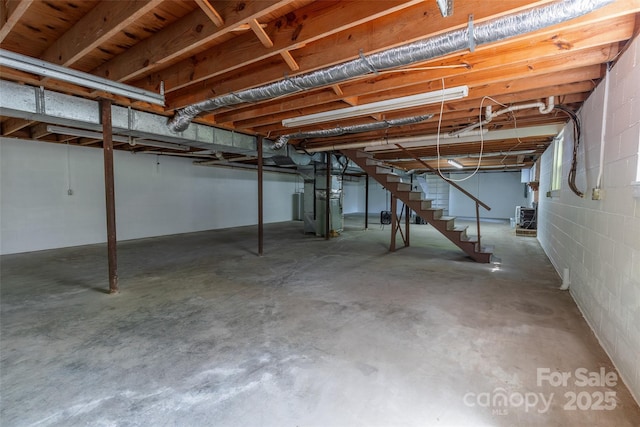 621 Big Lick Rd, Oakboro, NC 28129 - unfinished below grade area featuring stairway