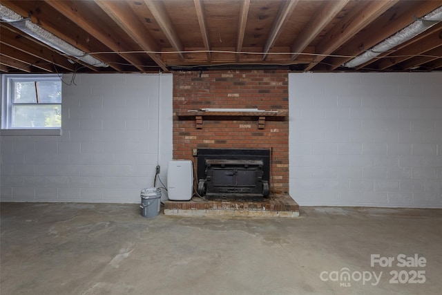 621 Big Lick Rd, Oakboro, NC 28129 - basement featuring a wood stove