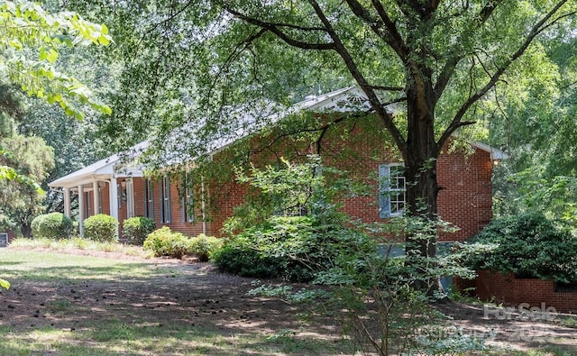621 Big Lick Rd, Oakboro, NC 28129 - view of home's exterior featuring brick siding