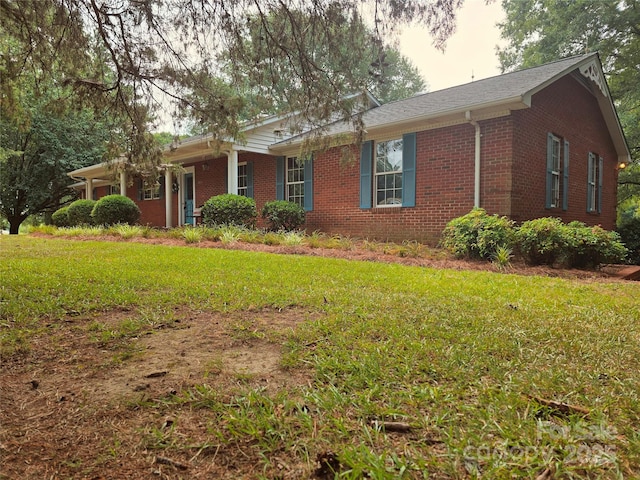 621 Big Lick Rd, Oakboro, NC 28129 - single story home featuring brick siding and a front yard