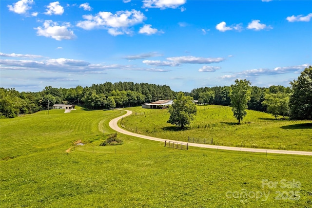 179 J And W Rd, Olin, NC 28660 - view of grassy yard featuring a rural view and a view of trees