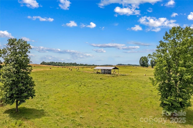 179 J And W Rd, Olin, NC 28660 - view of grassy yard with a view of rural / pastoral area and a carport