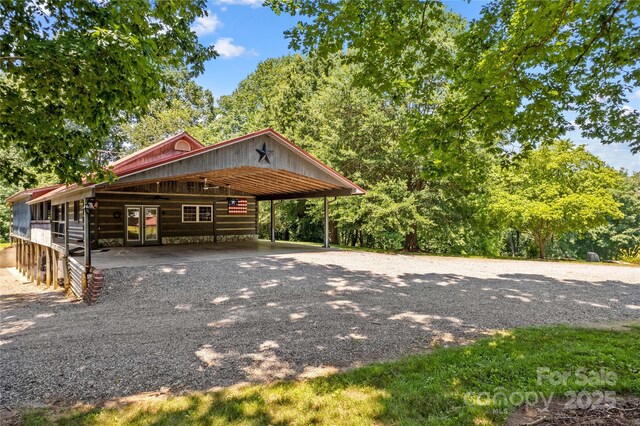 179 J And W Rd, Olin, NC 28660 - exterior space with driveway and a carport