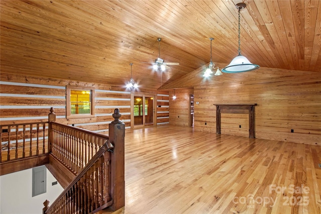 179 J And W Rd, Olin, NC 28660 - additional living space with wood ceiling, lofted ceiling, a ceiling fan, wood finished floors, and wooden walls
