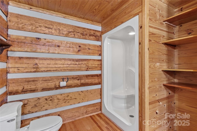 179 J And W Rd, Olin, NC 28660 - full bath featuring wood walls, a shower, and wood finished floors