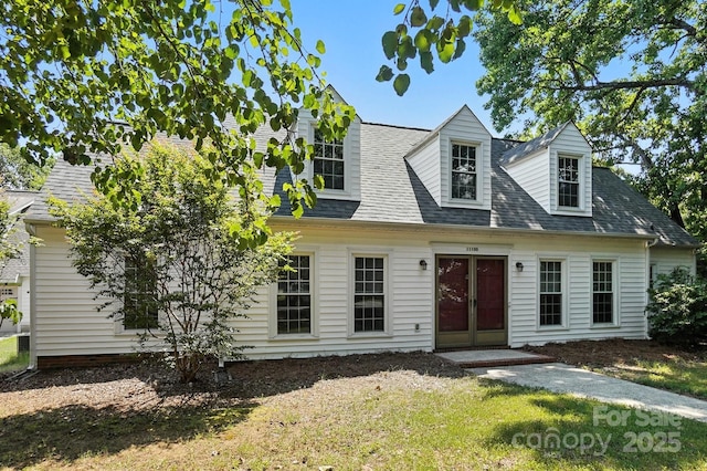 11100 Painted Tree Rd, Charlotte, NC 28226 - cape cod house with a shingled roof, a front yard, and french doors