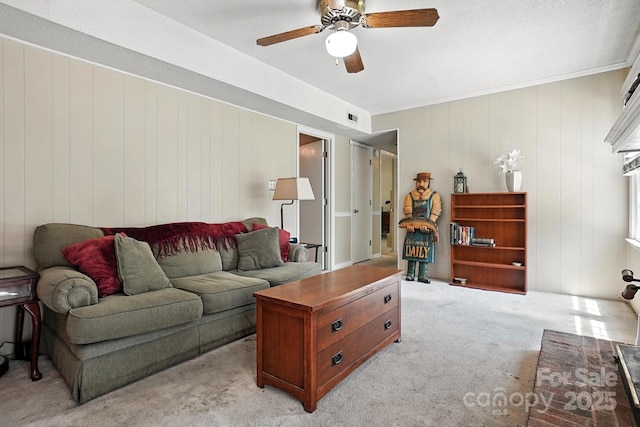 11100 Painted Tree Rd, Charlotte, NC 28226 - living area featuring ceiling fan, light carpet, crown molding, and wood walls