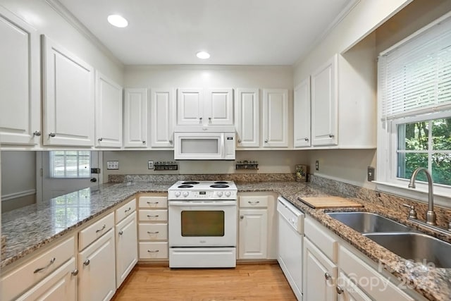 11100 Painted Tree Rd, Charlotte, NC 28226 - kitchen with white appliances, plenty of natural light, white cabinetry, and recessed lighting