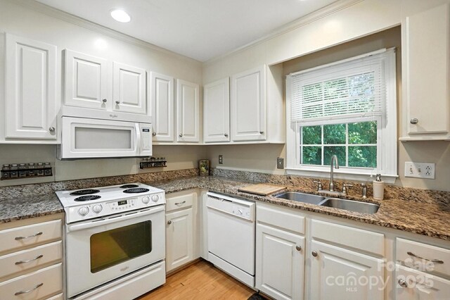 11100 Painted Tree Rd, Charlotte, NC 28226 - kitchen featuring white appliances, white cabinetry, crown molding, light wood finished floors, and dark stone counters