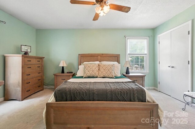 11100 Painted Tree Rd, Charlotte, NC 28226 - bedroom featuring light carpet, a closet, and ceiling fan