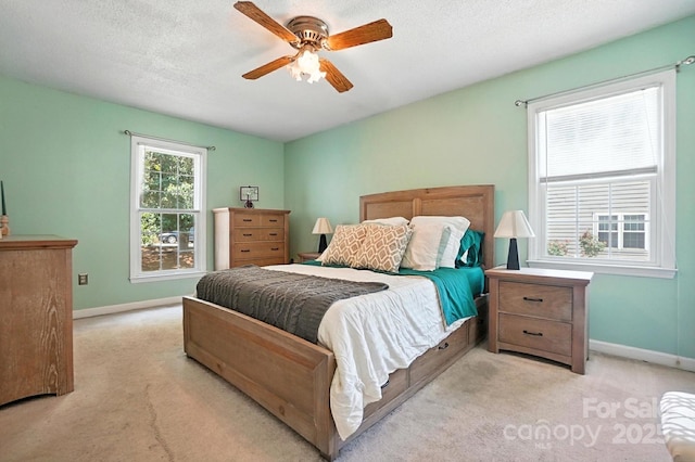 11100 Painted Tree Rd, Charlotte, NC 28226 - carpeted bedroom featuring baseboards and ceiling fan