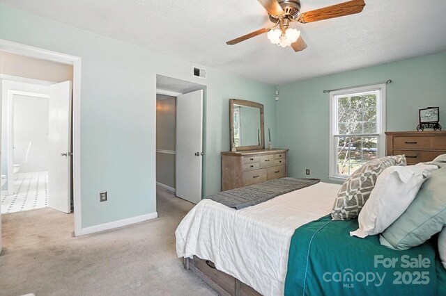 11100 Painted Tree Rd, Charlotte, NC 28226 - carpeted bedroom with baseboards and ceiling fan