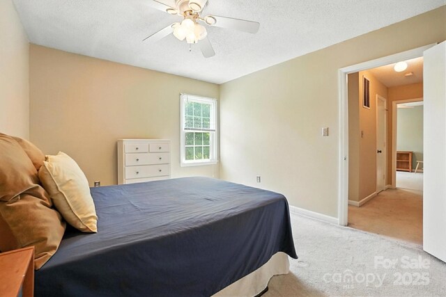 11100 Painted Tree Rd, Charlotte, NC 28226 - bedroom with light colored carpet and ceiling fan