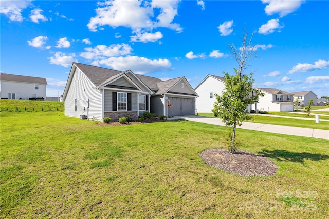 226 Caley St, Kings Mountain, NC 28086 - view of front of house with driveway, a garage, a front yard, and a residential view