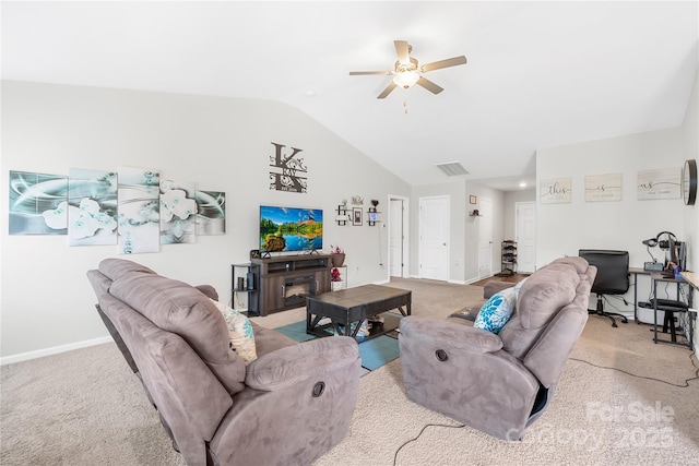 226 Caley St, Kings Mountain, NC 28086 - living room featuring vaulted ceiling, light colored carpet, ceiling fan, an office area, and a fireplace
