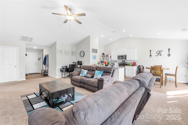 226 Caley St, Kings Mountain, NC 28086 - living room featuring lofted ceiling, a ceiling fan, recessed lighting, and light colored carpet