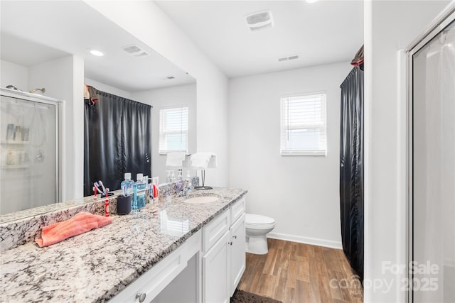 226 Caley St, Kings Mountain, NC 28086 - bathroom with wood finished floors, vanity, a stall shower, and recessed lighting