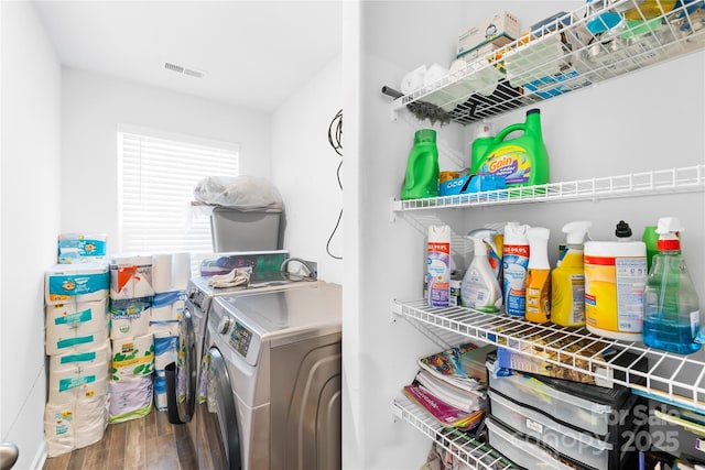 226 Caley St, Kings Mountain, NC 28086 - laundry room with washing machine and clothes dryer and wood finished floors