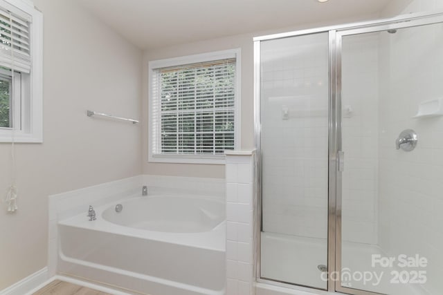 9836 Coatbridge Dr NW, Charlotte, NC 28269 - bathroom featuring a garden tub and a stall shower